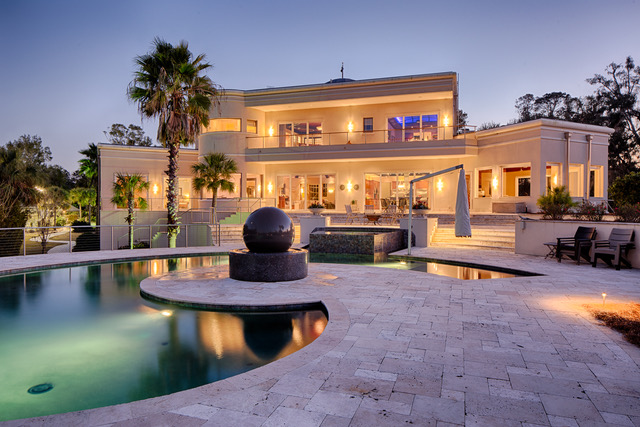 mansion with pool night